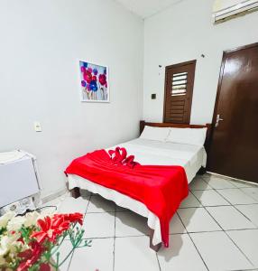 Ein Bett oder Betten in einem Zimmer der Unterkunft Pousada Cafe e Mar Jeri