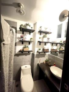 Et badeværelse på Bonito apartamento en zona 1 Ciudad de Guatemala