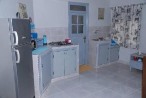 Kuchyň nebo kuchyňský kout v ubytování Élégant Studio