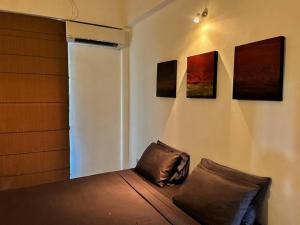Łóżko lub łóżka w pokoju w obiekcie Colombo City Villa by Ceylon Spaces