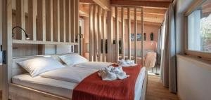 Ένα ή περισσότερα κρεβάτια σε δωμάτιο στο Unterkunft EXCLUSIVE FERIENWOHNUNG MIT EIGENER SAUNA