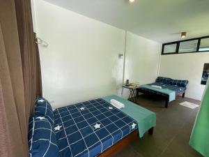 Postel nebo postele na pokoji v ubytování Fins Pacific Coray Bay by Hiverooms
