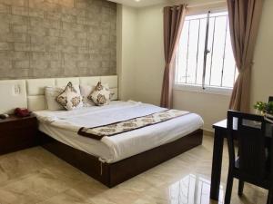 Giường trong phòng chung tại Dịu Dàng Hotel - 19 Trần Kim Hùng, Nha Trang - by Bay Luxury