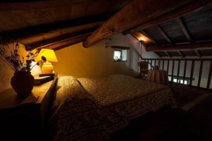 Ένα ή περισσότερα κρεβάτια σε δωμάτιο στο Gesamtes Appartement in Vergemoli mit Eigener Terrasse