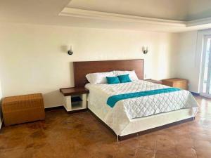 Krevet ili kreveti u jedinici u okviru objekta Moderna casa de 3 dormitorios con cama King size y vistas al horizonte de la piscina