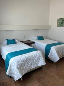 Krevet ili kreveti u jedinici u okviru objekta Moderna casa de 3 dormitorios con cama King size y vistas al horizonte de la piscina