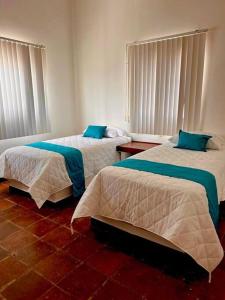 Krevet ili kreveti u jedinici u okviru objekta Moderna casa de 3 dormitorios con cama King size y vistas al horizonte de la piscina