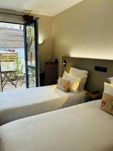 Cama ou camas em um quarto em Castel Fleuri