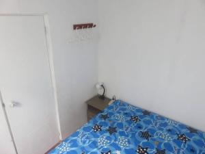 Katil atau katil-katil dalam bilik di Casa de playa frente a la arena