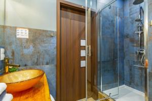 Kúpeľňa v ubytovaní Smile Apartments Center Kraków Old Town + 37 fotografií