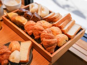 a bunch of different types of bread and pastries at THE GENERAL KYOTO Bukkouji Shinmachi in Kyoto