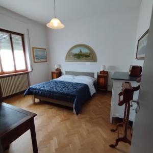 Postel nebo postele na pokoji v ubytování Casa Ugo