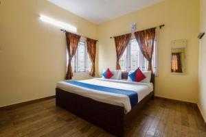 Postel nebo postele na pokoji v ubytování STARLIGHT HOTELS KODAI