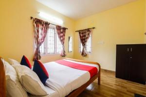 Postel nebo postele na pokoji v ubytování STARLIGHT HOTELS KODAI