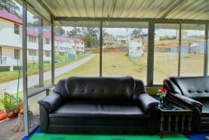 Posezení v ubytování STARLIGHT HOTELS KODAI