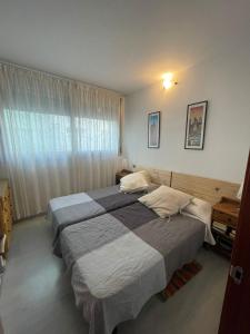 Postel nebo postele na pokoji v ubytování Apartamentos Elegance Denia + 37 fotografií