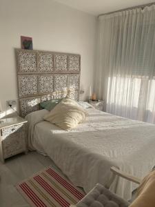 Postel nebo postele na pokoji v ubytování Apartamentos Elegance Denia