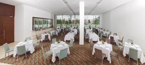 Restoran või mõni muu söögikoht majutusasutuses Estelar Alto Prado