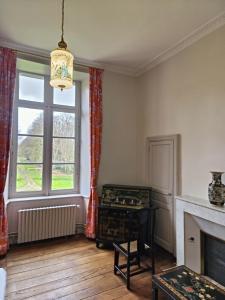 Posezení v ubytování Le Château des Portes