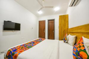 Postel nebo postele na pokoji v ubytování FabHotel Gazelle Inn I