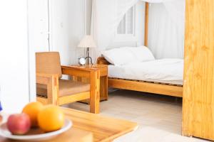 AFEX Rivercamp客房内的一张或多张床位