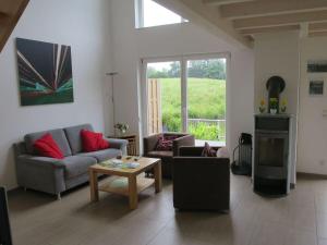 Posezení v ubytování Cosy apartment by the lake