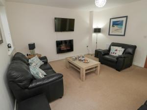 Μια τηλεόραση ή/και κέντρο ψυχαγωγίας στο Beach House