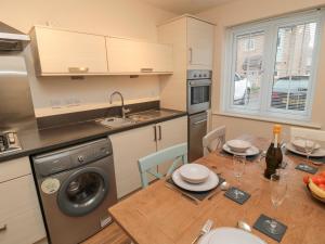 Η κουζίνα ή μικρή κουζίνα στο Beach House