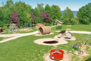 a park with a play area with a playground at Holiday village on the Baltic Sea Wohlenberg in Wohlenberg