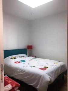 Cama ou camas em um quarto em Typique longère pornicaise