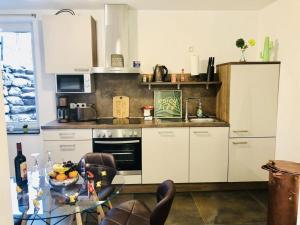 Η κουζίνα ή μικρή κουζίνα στο Cosy apartment in Duisburg