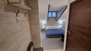 Ліжко або ліжка в номері Central Hotel