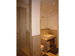 a bathroom with a toilet and a sink at Pleasant apartment in Münster in Münster