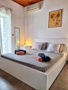 Voodi või voodid majutusasutuse LeMaMi Seafront Bungalows toas