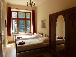 En eller flere senger på et rom på Amazing apartment in Görlitz