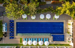 an overhead view of a swimming pool in a resort at Montigo Resorts Seminyak in Seminyak
