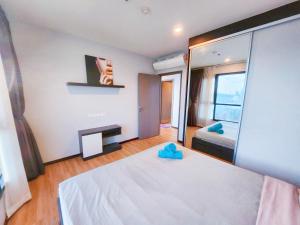 Cama o camas de una habitación en 泰国芭提雅thebase无边游泳池公寓