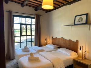 Кровать или кровати в номере Yeguada Senillosa - Turismo Rural
