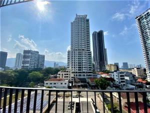 a view of a city skyline with tall buildings at Corner Club Penang in George Town +22 photos