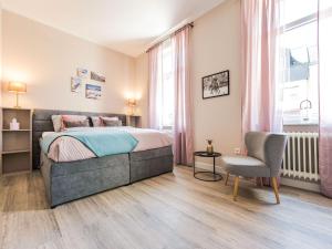 Llit o llits en una habitació de Villa Rosa studio apartment in Bad Camberg