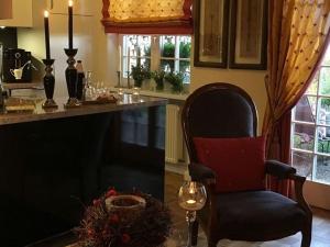 Posezení v ubytování Holiday Apartment Garden Suite