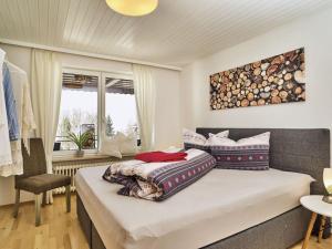 Un pat sau paturi într-o cameră la Holiday home Landhaus am Büchelstein