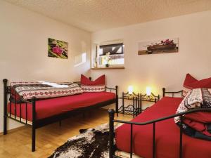Un pat sau paturi într-o cameră la Holiday home Landhaus am Büchelstein