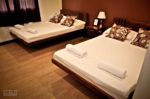 Postel nebo postele na pokoji v ubytování Cleon Villas Pension