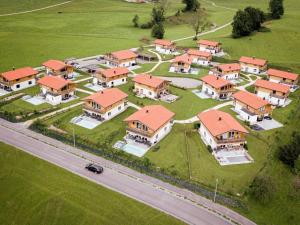 an aerial view of a large house with orange roofs at Inzell Chalets with private pool in Inzell