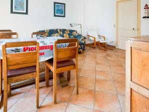 a dining room with a pizza delivery sign on a table at Luxurious Mansion in Castle Grounds in Lantheuil in Lantheuil