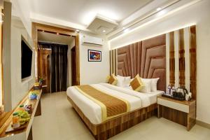 Postel nebo postele na pokoji v ubytování Hotel Star Villa - Front of New Delhi Railway Station & 5 Minute from Connaught Place
