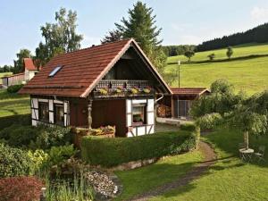 a small house in the middle of a field at Appealing apartment in Motten in Motten