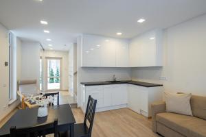 Posezení v ubytování Cottage by the Baltic