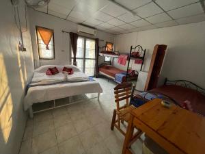 Postel nebo postele na pokoji v ubytování Noot's Guesthouse